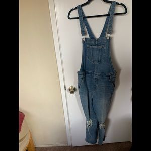 Size 12 overalls! So cute and comfortable, great fit! Cute zipper in the side!